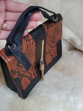 Black & Orange Snake-Print Top-Handle Bag with Gold Tassel